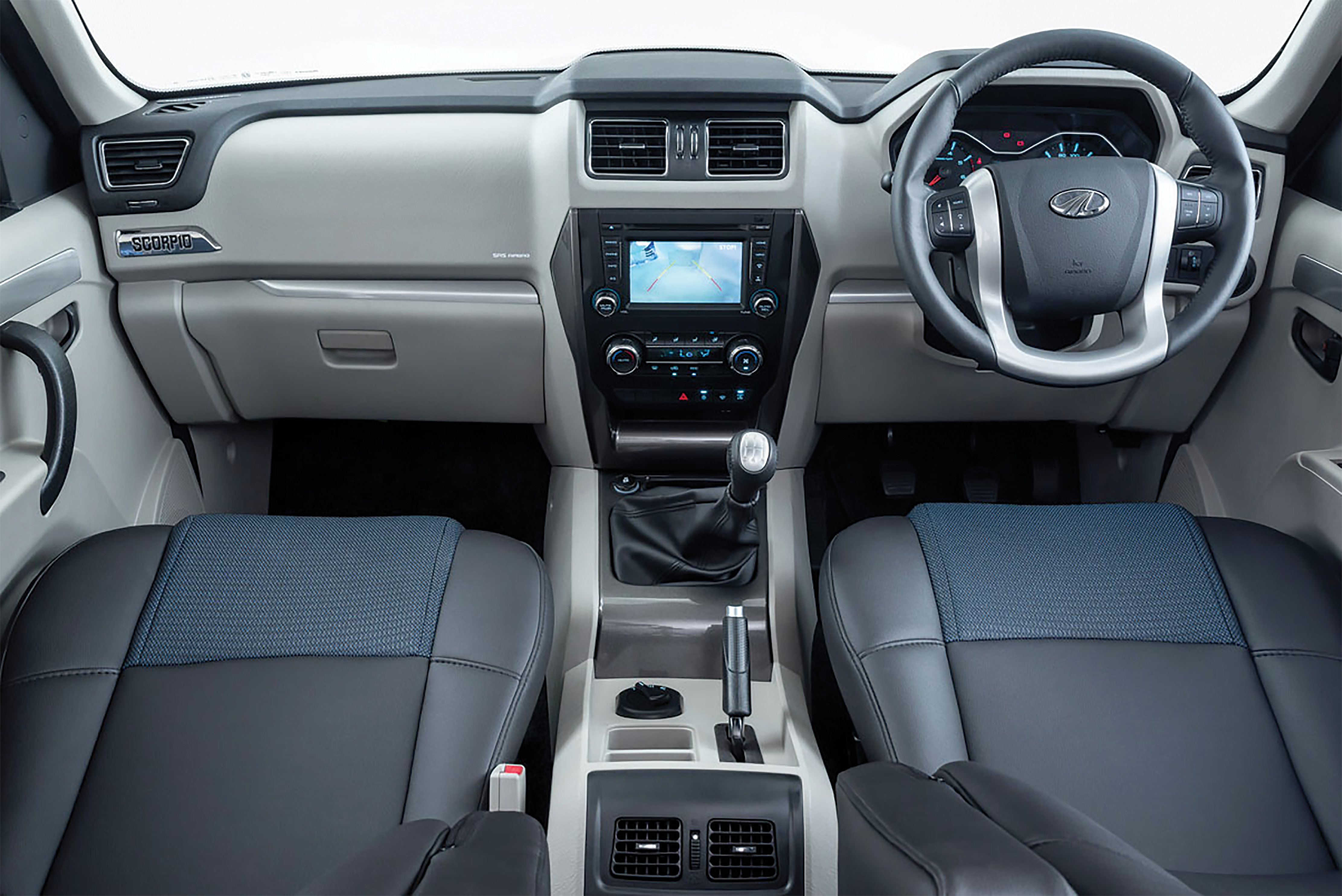 DECENT: The Scorpio S11’s plush interior features seats finished in black faux leather
with navy fabric inserts, fully automatic digital climate control, and a fully adjustable
driver’s seat to ensure a comfortable driving experience over long distances