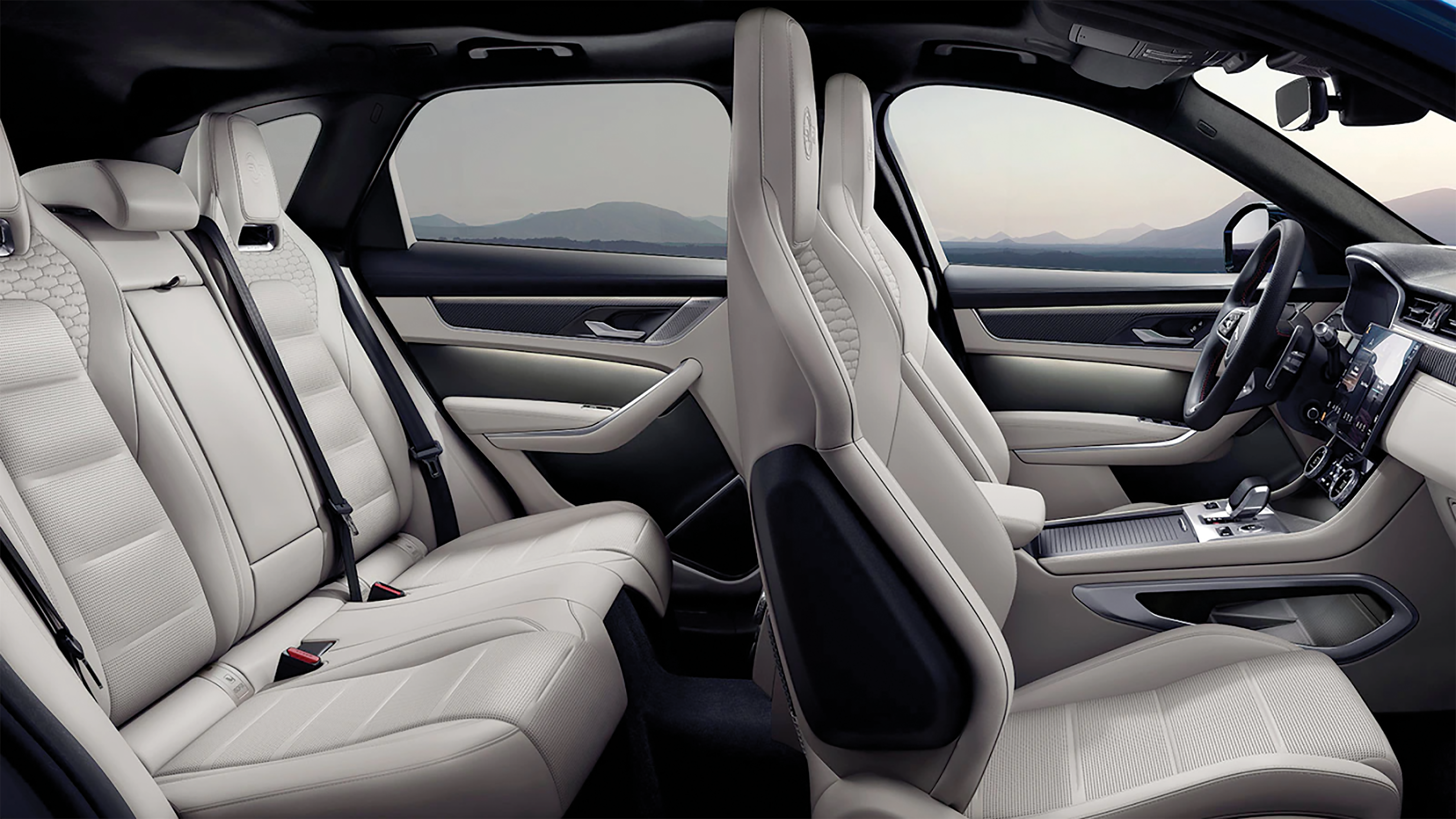 SPORTY LUXURY: The leather sports seats with heritage logo-inspired diamond embroidery across the front shoulder section. An embossed SVR logo on the headrests adds a final flourish.