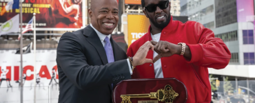 ICON: New York mayor Eric Adams, presenting the Key to the City of New York to hip-hop artist Sean “Diddy” Combs at the city’s Times Square today. PHOTO: Office of the New York Mayor/Caroline Rubinstein-Willis