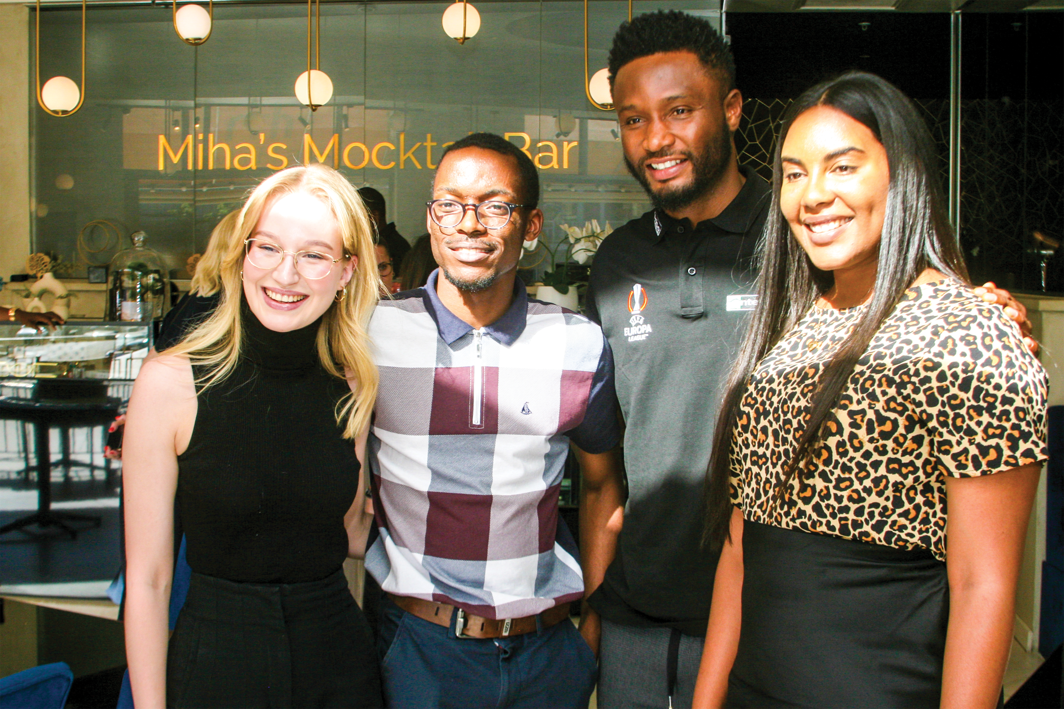 John Obi Mikel, ex-Nigeria and Chelsea footballer, snapped posing with admirers during the UEFA Europa League trophy showcase at Melrose Arch.