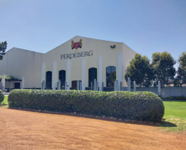 TERRAIN: A long and winding road to the backwoods of Western Cape’s Paarl takes a wine enthusiast to the oasis at Perdeberg Cellar, where hun- ger and thirst instantly become a thing of the past. PHOTOS: Len Maseko