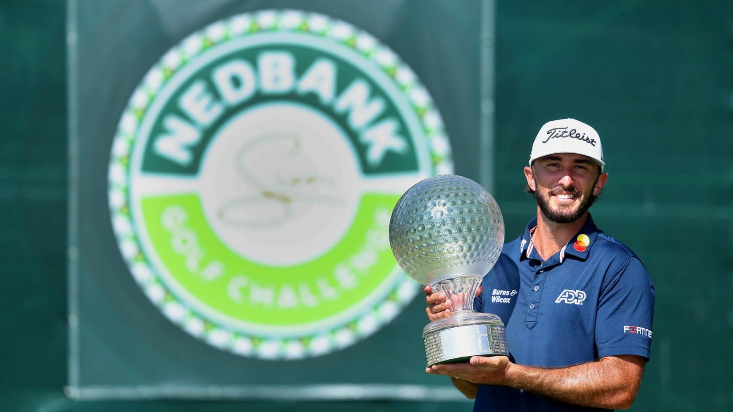 THE LION:

Max Homa of the United States holds the trophy as he celebrates victory after winning the tournament during Day Four of the Nedbank Golf Challenge at Gary Player CC on Sunday in Sun City.