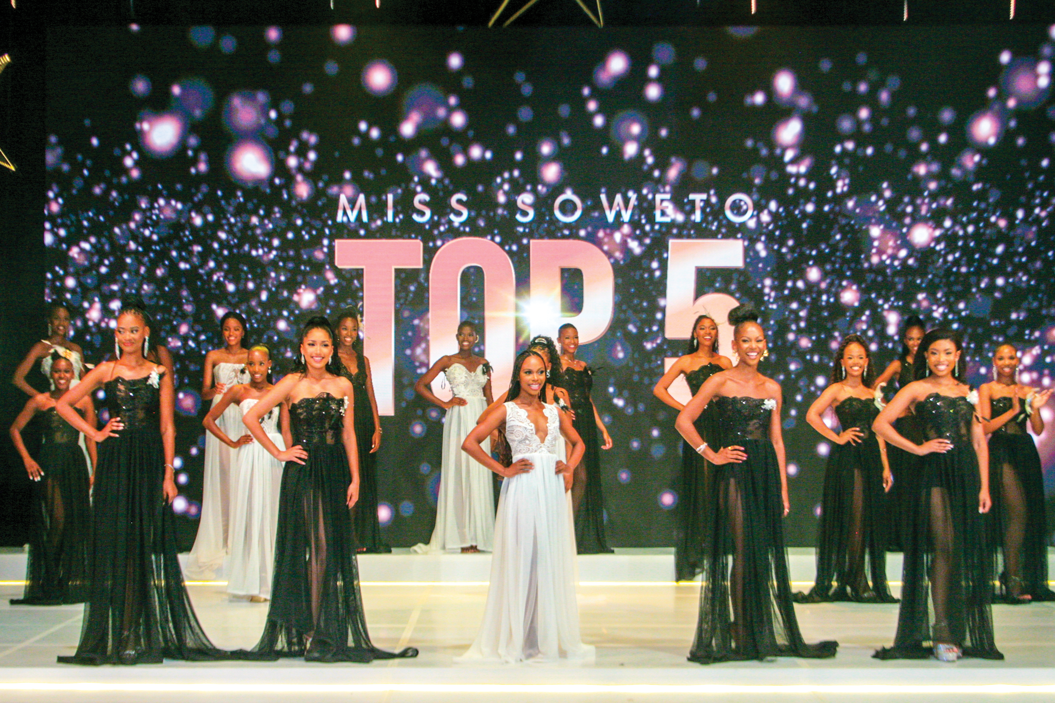 Image of the Top 5 finalists on stage during the White Star Miss Soweto 2023 pageant at the Soweto Theatre.