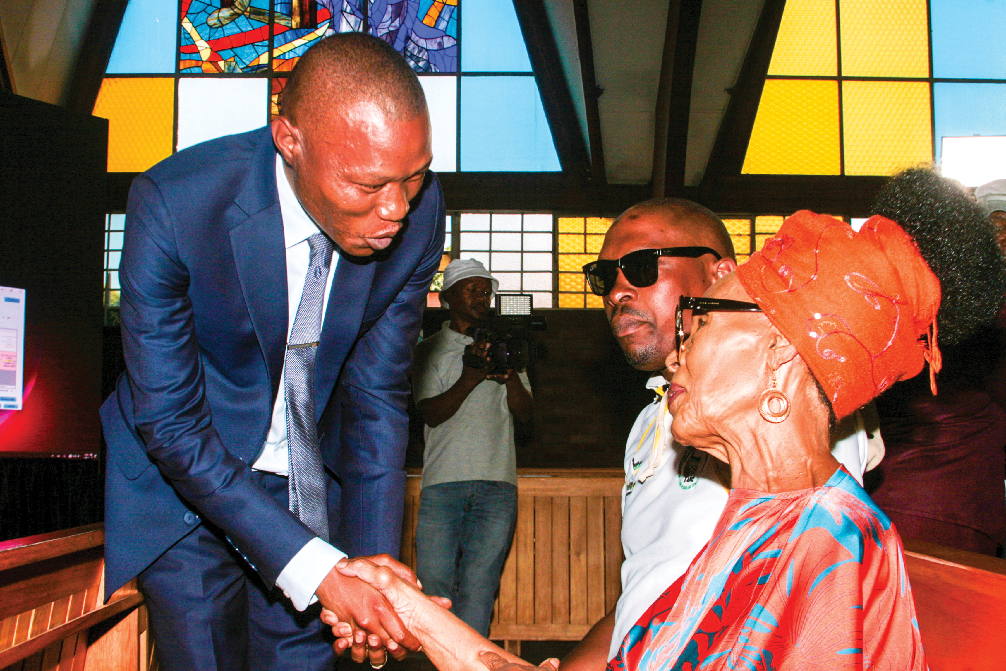 Mayor of the City of Johannesburg Kabelo Gwamanda greeting singer, Abigail Kubheka