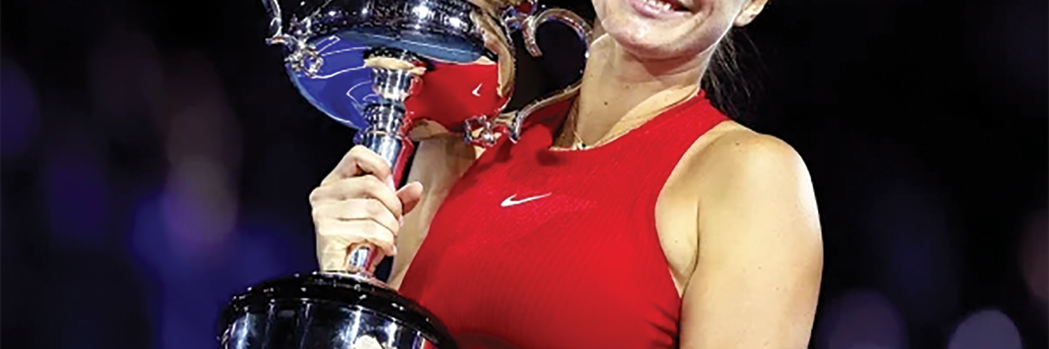 GOLDEN SMILE: Aryna Sabalenka savouring her moment of joy by lifting the Australian Open trophy she succesfully defended for a second time running on Saturday