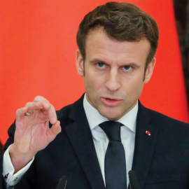 BRAVE FACE;President Emmanuel Macron is taking no chances